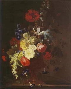 Bouquet with hollyhock, opium poppy, and other flowers in a vase with medallion by Justus van Huysum I