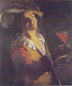 Laughing boy with wineglass