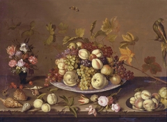 Still life with a bowl of fruit surrounded by flowers, shells, fruit, insects and a parrot by Balthasar van der Ast
