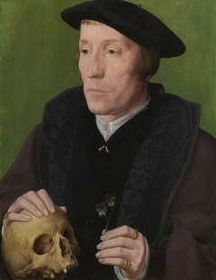 A Man with a Pansy and a Skull by a follower of Jan van Scorel