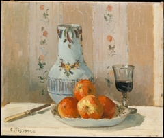 'Ghâtaignier' Apples and Glazed Earthenware on a Table