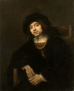 Portrait of a Young Man in an Armchair by Rembrandt