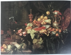 Sumptuous Still Life with Fruit and Vegetables, Covered Beaker, Ewer and Wine Glass with Parrot on a Perch