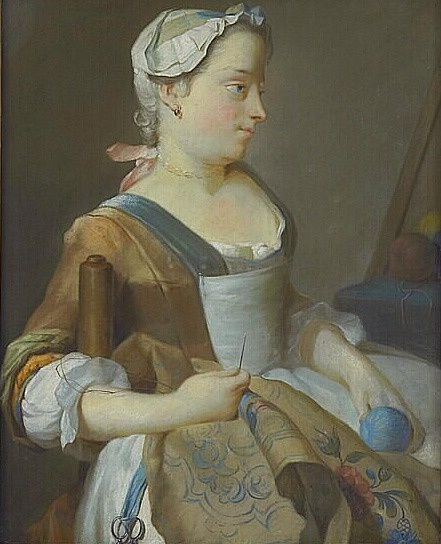 Young woman sewing