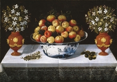 Delft Fruit Bowl and two Vases of Flowers by Tomás Yepes