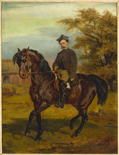 Portrait of a horseman in a peaked cap by Juliusz Kossak