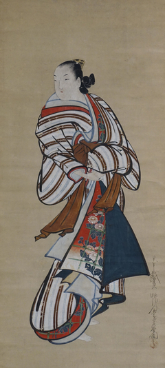 Standing Courtesan Looking Over Her Shoulder by Kaigetsudō Dohan