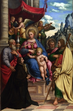 The Madonna and Child with Angels, Saints and a Donor by Girolamo da Treviso the Younger