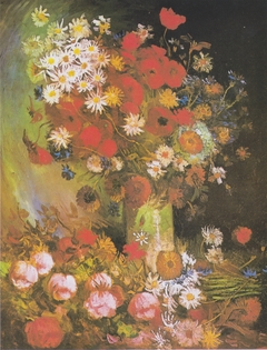 Vase with cornflowers and poppies, peonies and chrysanthemums