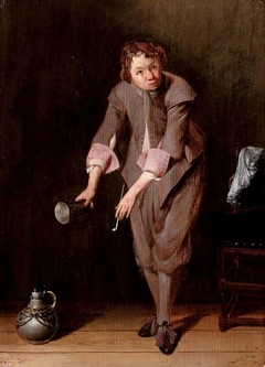 A youth holding a silver cup and a pipe by Willem Cornelisz Duyster