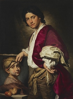 Portrait of a young painter with a portrait of a boy