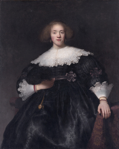 Portrait of a Young Woman with a Fan by Rembrandt