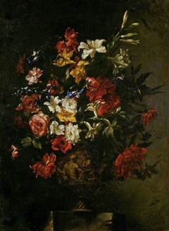 Flowers in a sculptured vase by Bartolomé Pérez