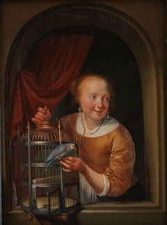 Girl with a Parrot by Pieter Cornelisz van Slingelandt