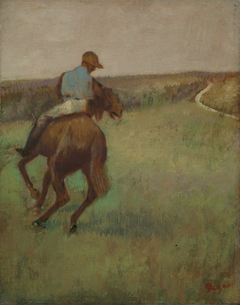 Jockey in Blue on a Chestnut Horse by Edgar Degas