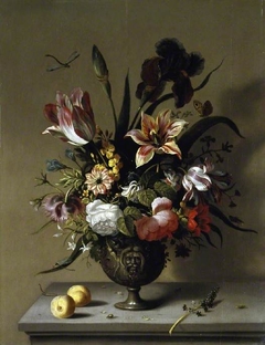 Metal vase of flowers