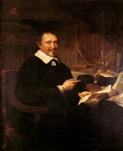Portrait of a man surrounded by books by Govert Flinck