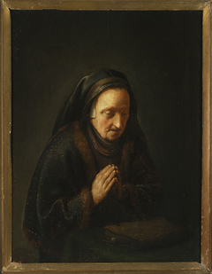 Praying old woman by Gerrit Dou