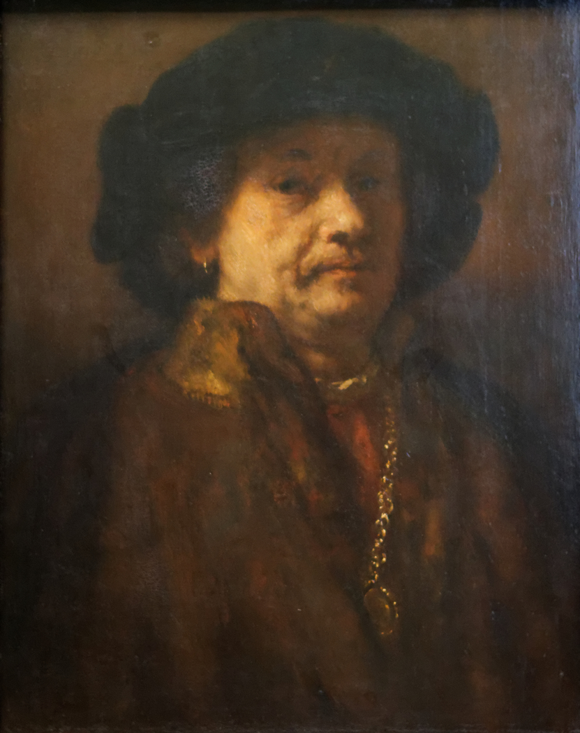 Self portrait in a fur coat with gold chain and earring