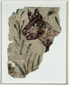 A fragment with an animal head (cat? jackal?) with simple stalks of vegetation by Anonymous