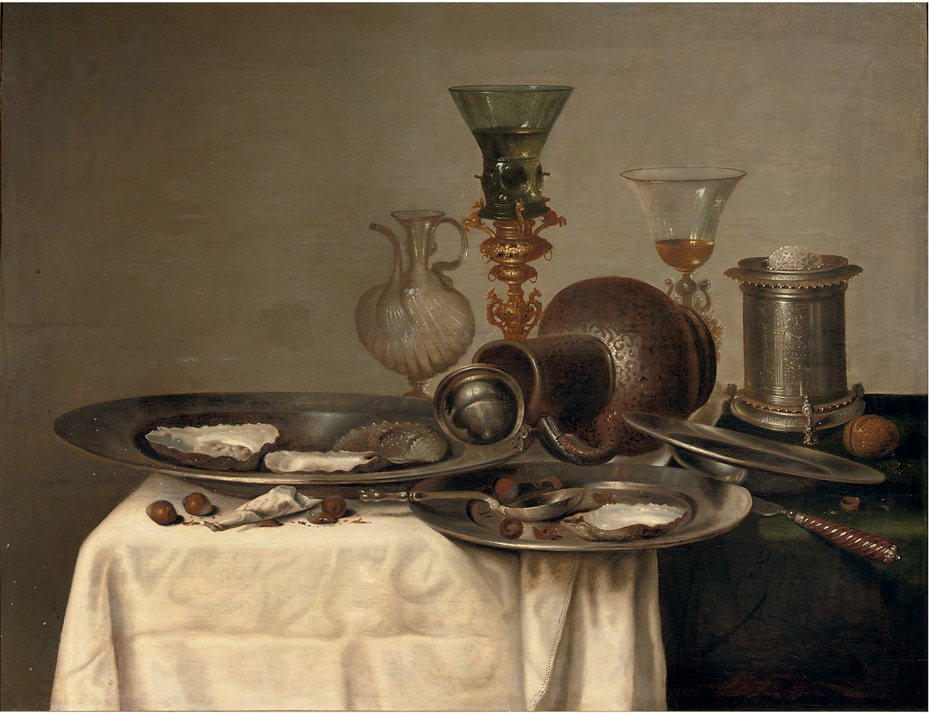Still life with oysters, fallen jug, wine glasses, hazelnuts, perfume bottle and pewter dishes on a partly draped table