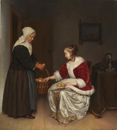 Two Women in an Interior with a Basket of Lemons by Caspar Netscher