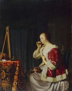 Young Woman at her Toilet by Frans van Mieris the Elder
