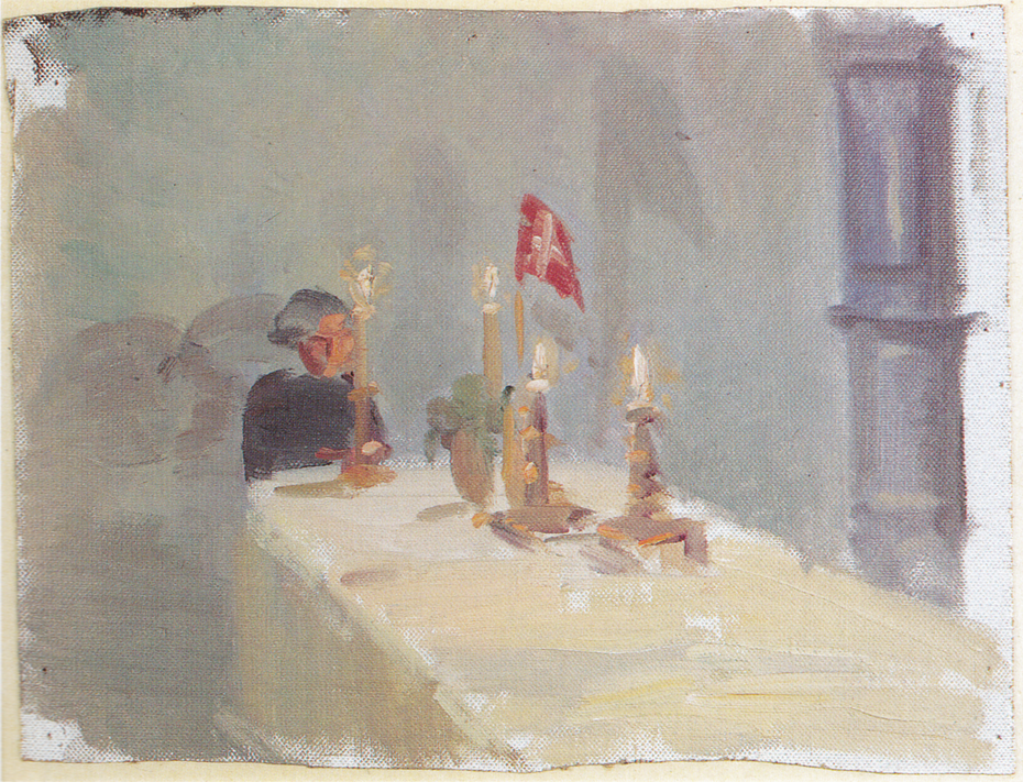 Birthday. A woman at the end of a table with candles and a flag
