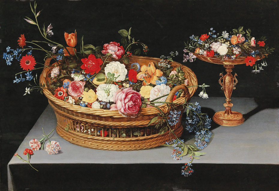 Mixed flowers in a basket with a tazza nearby