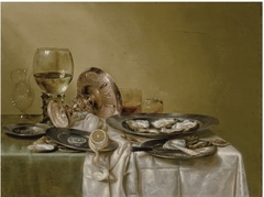 Still life with an overturned tazza and oysters