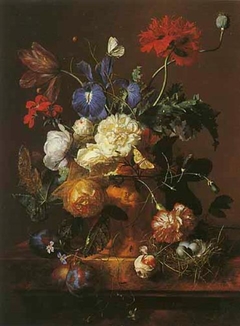 Vase of Flowers in a flower pot and a bird's nest on a marble slab by Jan van Huysum