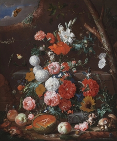 A Still Life of Flowers and Fruit arranged on a Stone Plinth in a Garden