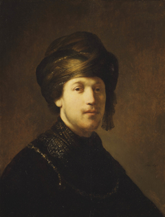 A Young Man Wearing a Turban by Follower of Rembrandt