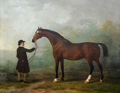 'Jason' a Bay Racehorse, with a Groom in a Landscape by Sawrey Gilpin