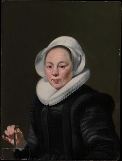Portrait of a Woman with a Balance by Thomas de Keyser
