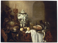 Still life with Ming vase, two goblets, pewter vessels and fruit