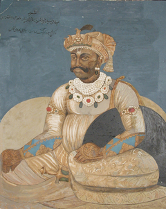 A Maratta raja seated against a bolster by Anonymous