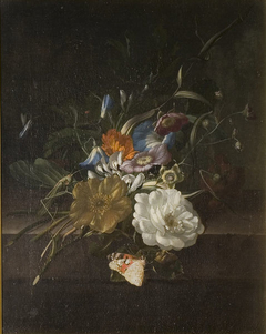 A still-life with a spray of flowers