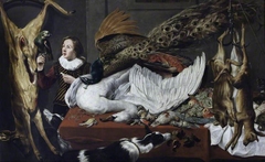 Hung Game with a Swan and a Peacock on a Table and a Page Holding a Parrot by Frans Snyders
