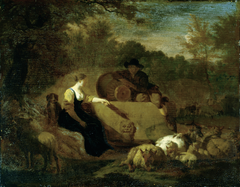 Shepherd's couple with their herd in a wooded landscape